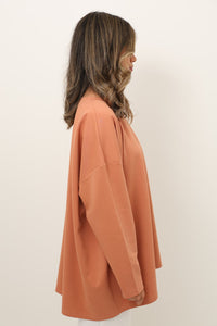 oversized soft orange long-sleeve t-shirt